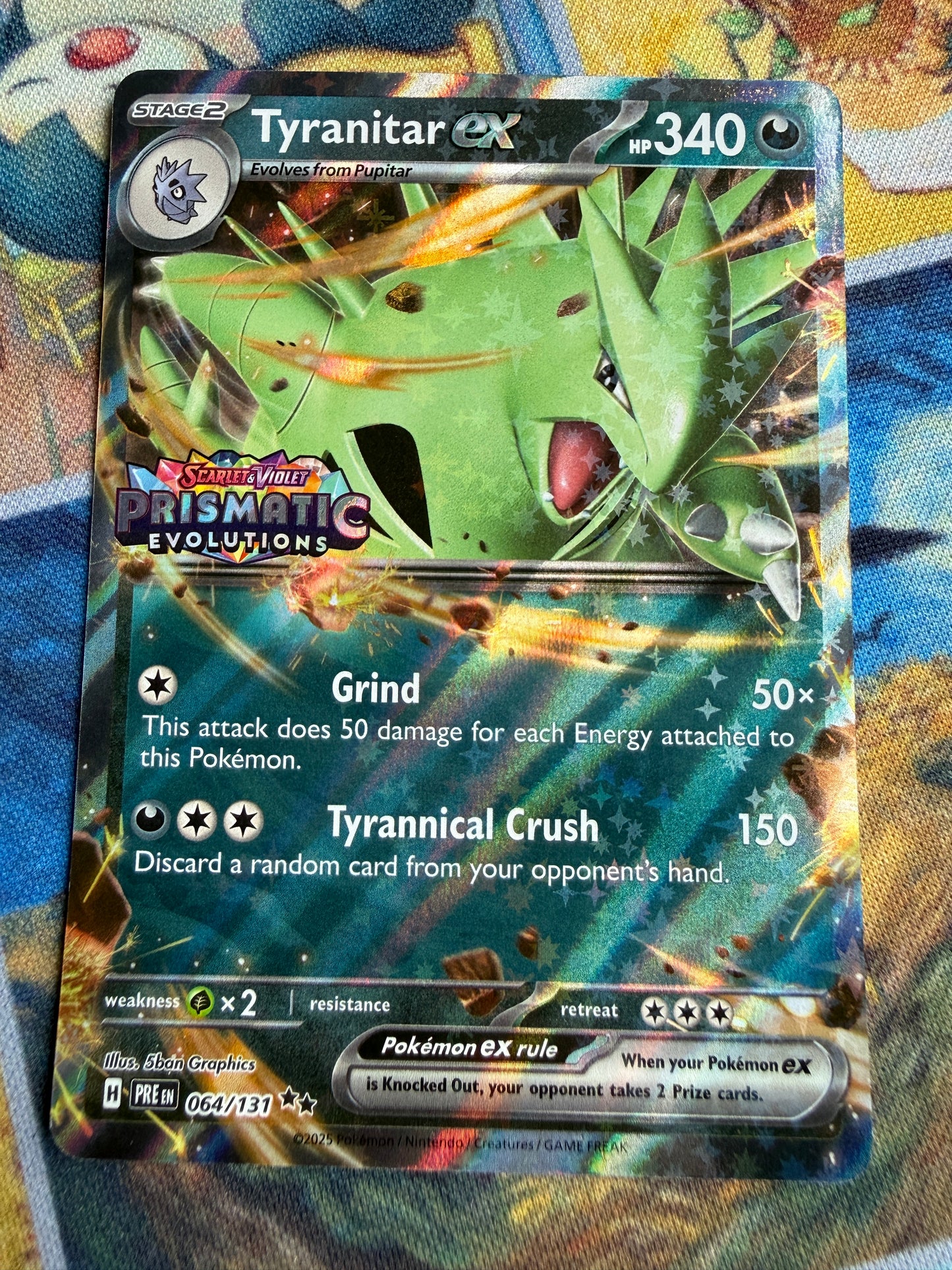 Tyranitar [Stamped] #64 Pokemon Prismatic Evolutions